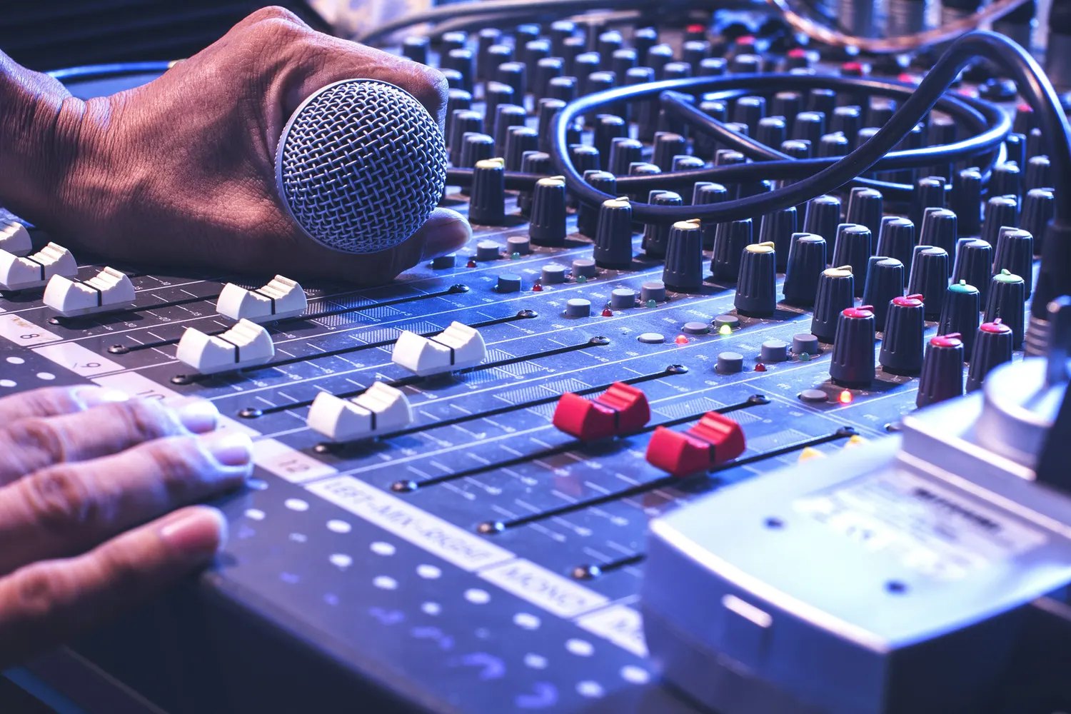 Production engineer mixing live event audio
